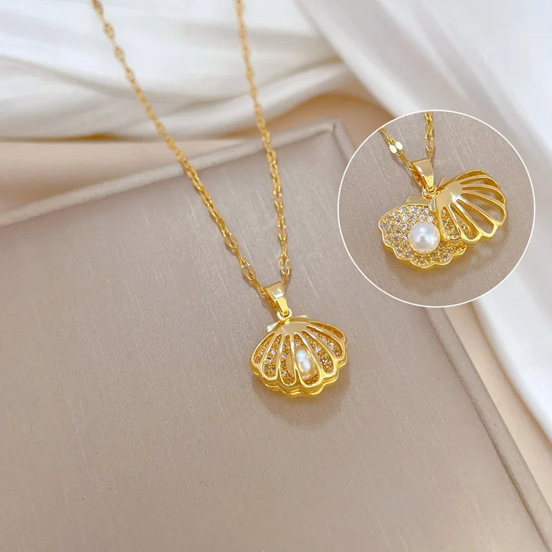 Collier de perles de coquillage ouvrable coréen.                  Korean Openable Shell Pearl Necklace