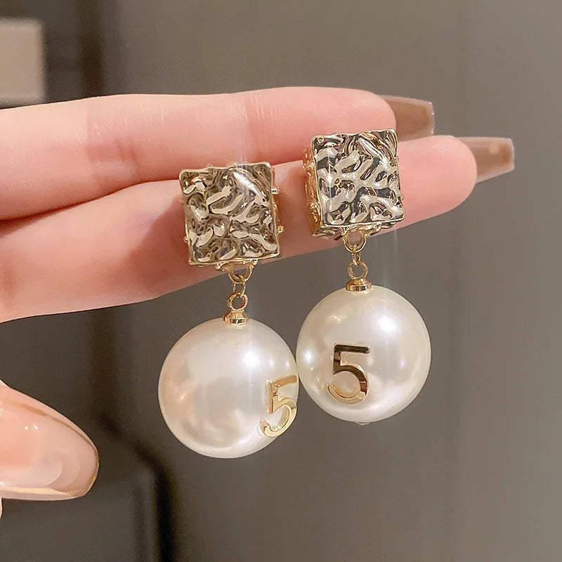 Boucles d'oreilles vintage en perles style CC