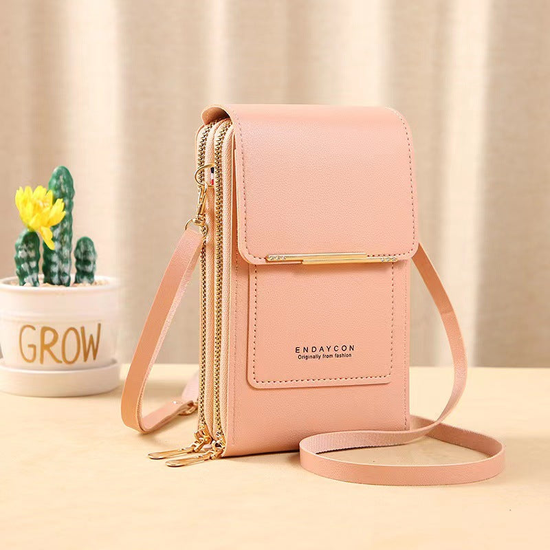Petit sac pour femme avec zone tactile transparente.