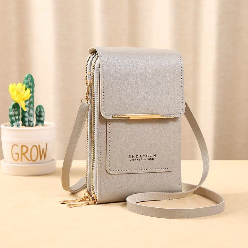 Petit sac pour femme avec zone tactile transparente.