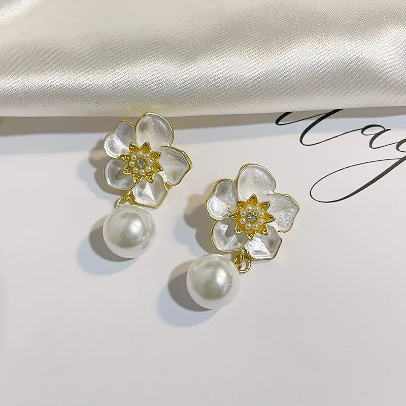 Boucles d'oreilles vintage en perles style CC