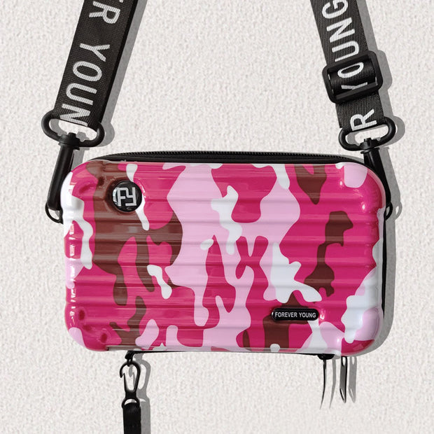 Mini-valise à bandoulière.