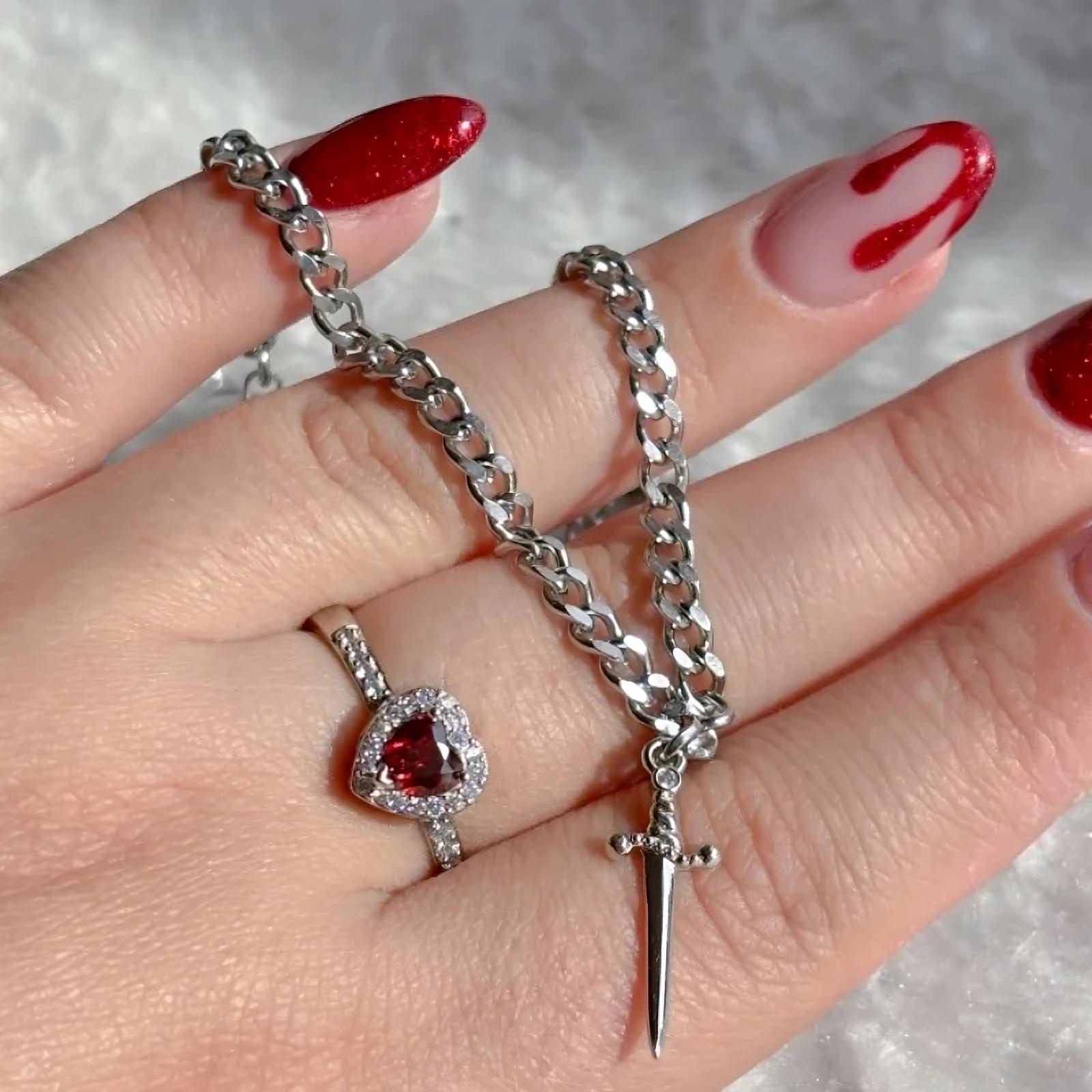 Ensemble bague cœur et bracelet épée