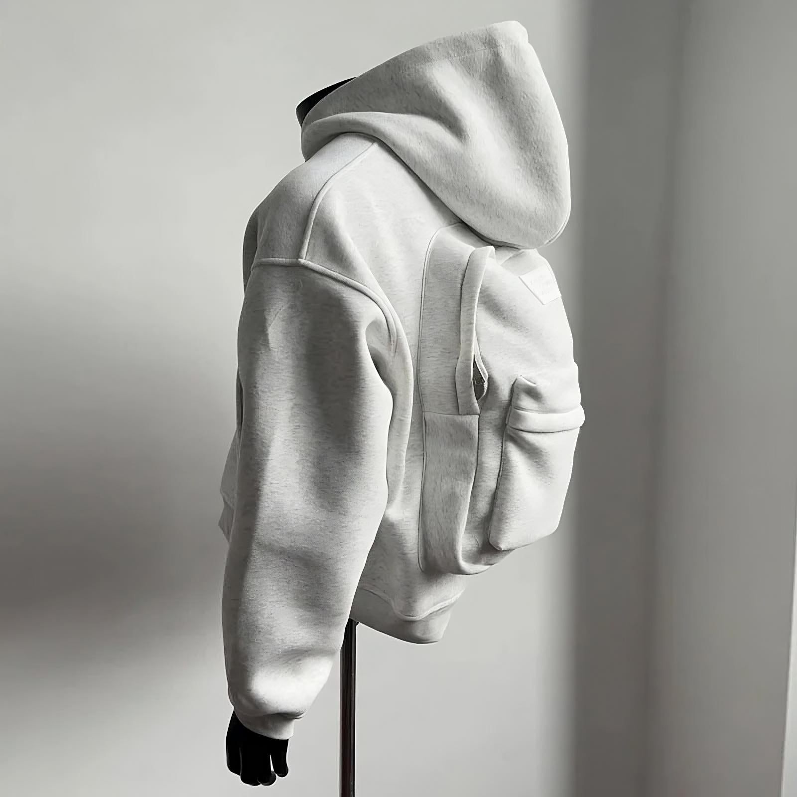 Sweat à capuche avec sac à dos intégré