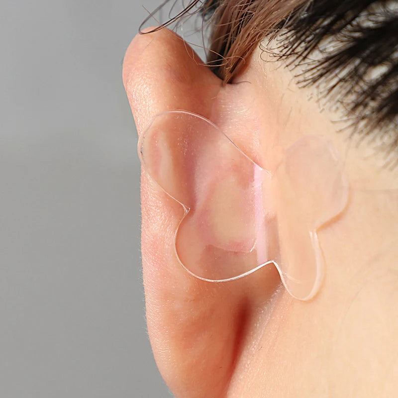 Autocollants correcteurs d’oreilles.