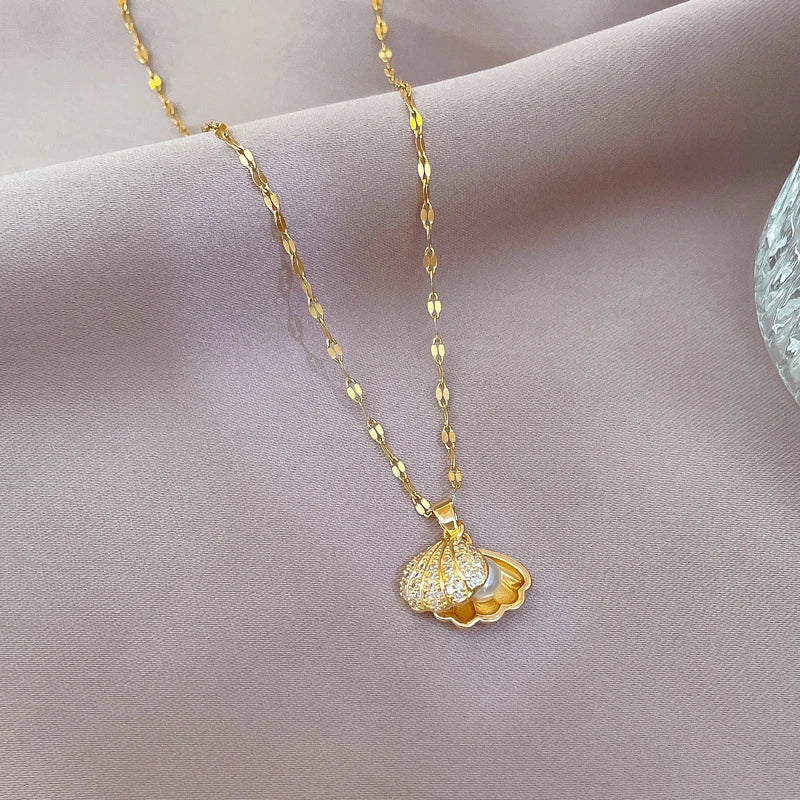 Collier de perles de coquillage ouvrable coréen.                  Korean Openable Shell Pearl Necklace