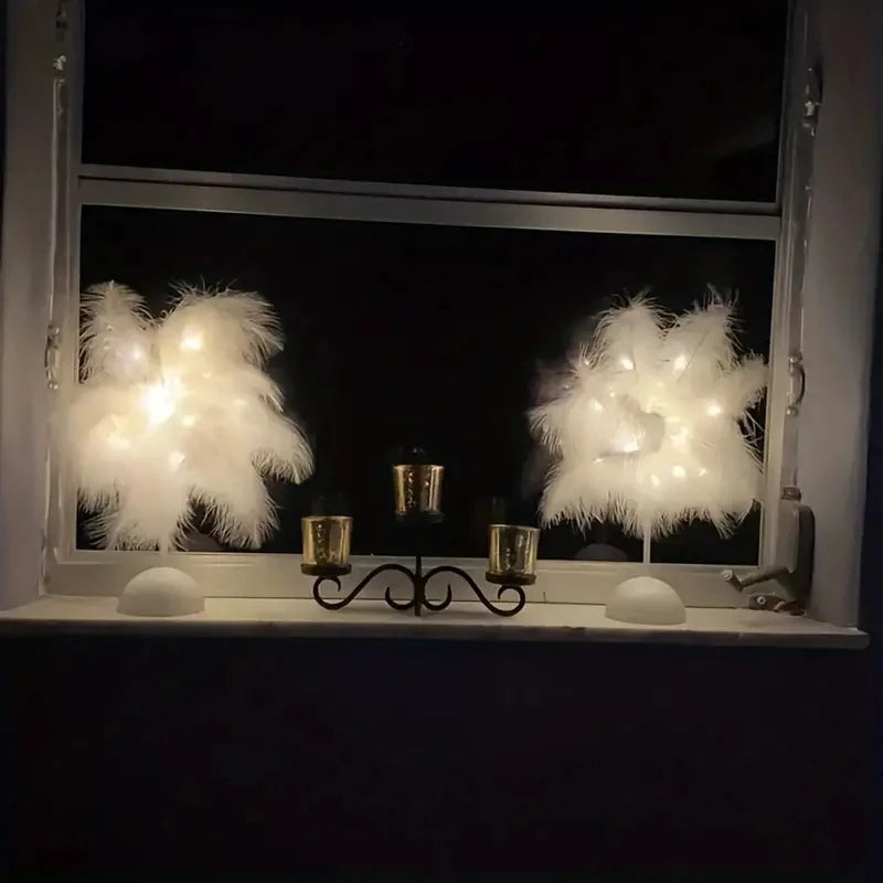 Lampe de table LED à motif de plumes.