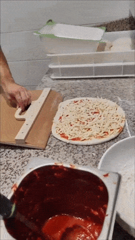 Pelle à pizza coulissante