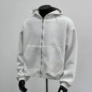 Sweat à capuche avec sac à dos intégré