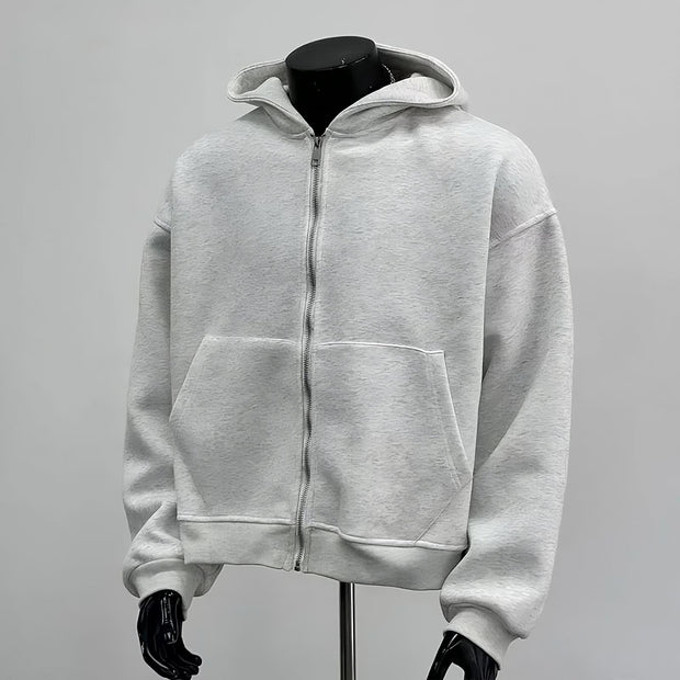 Sweat à capuche avec sac à dos intégré