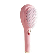 Brosse de massage télescopique autonettoyante