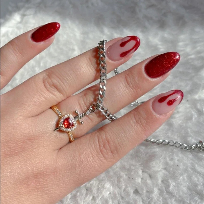 Ensemble bague cœur et bracelet épée