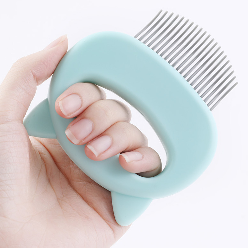 Peigne de toilettage et de massage pour chat