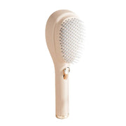 Brosse de massage télescopique autonettoyante