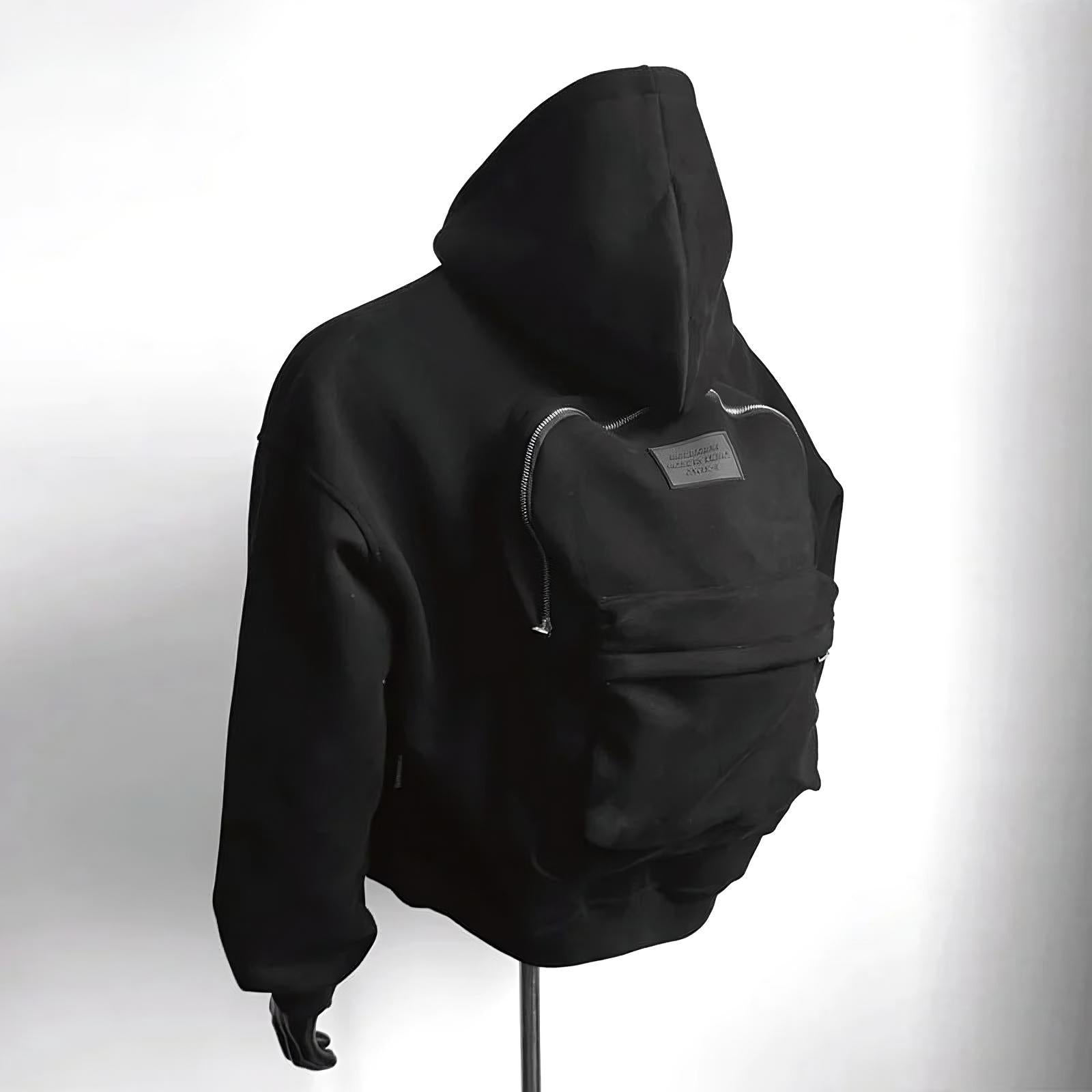 Sweat à capuche avec sac à dos intégré