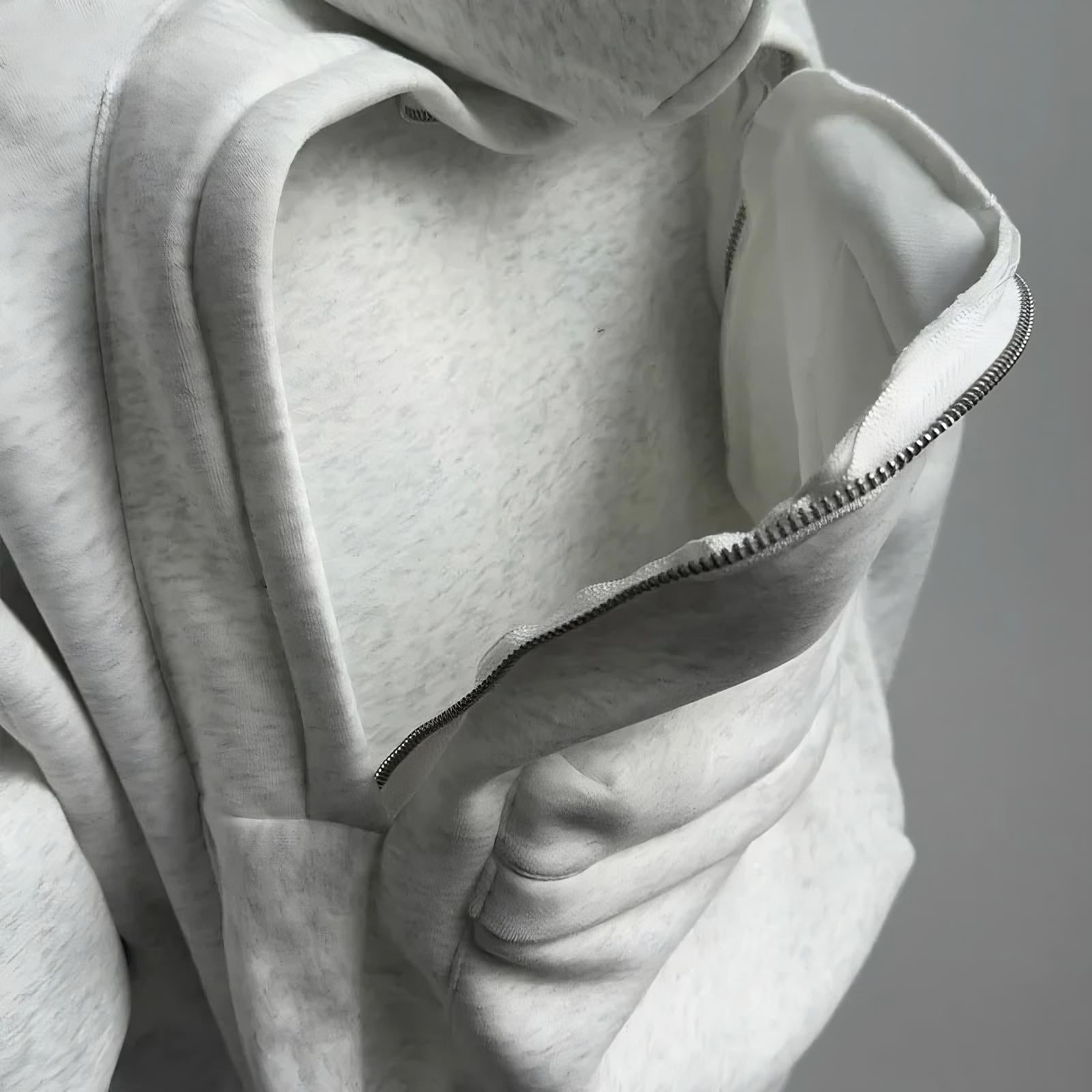 Sweat à capuche avec sac à dos intégré