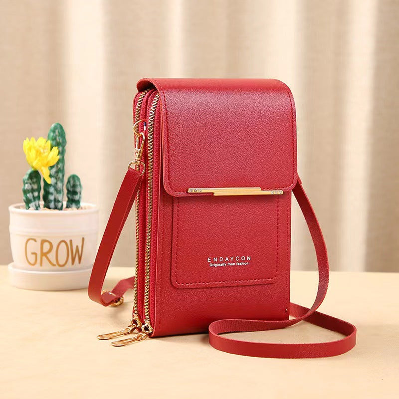 Petit sac pour femme avec zone tactile transparente.