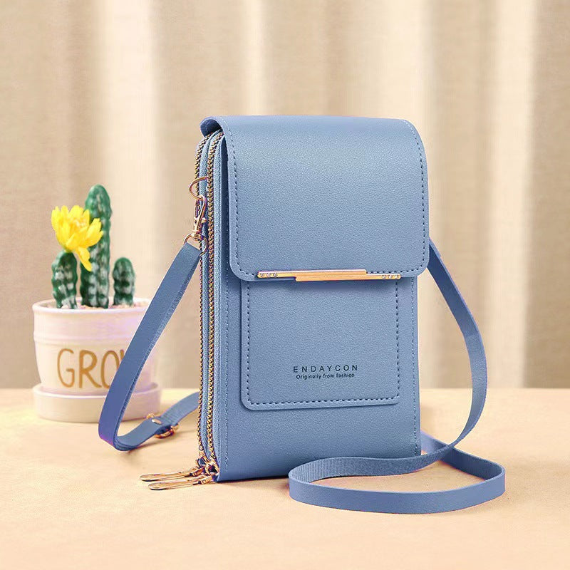 Petit sac pour femme avec zone tactile transparente.