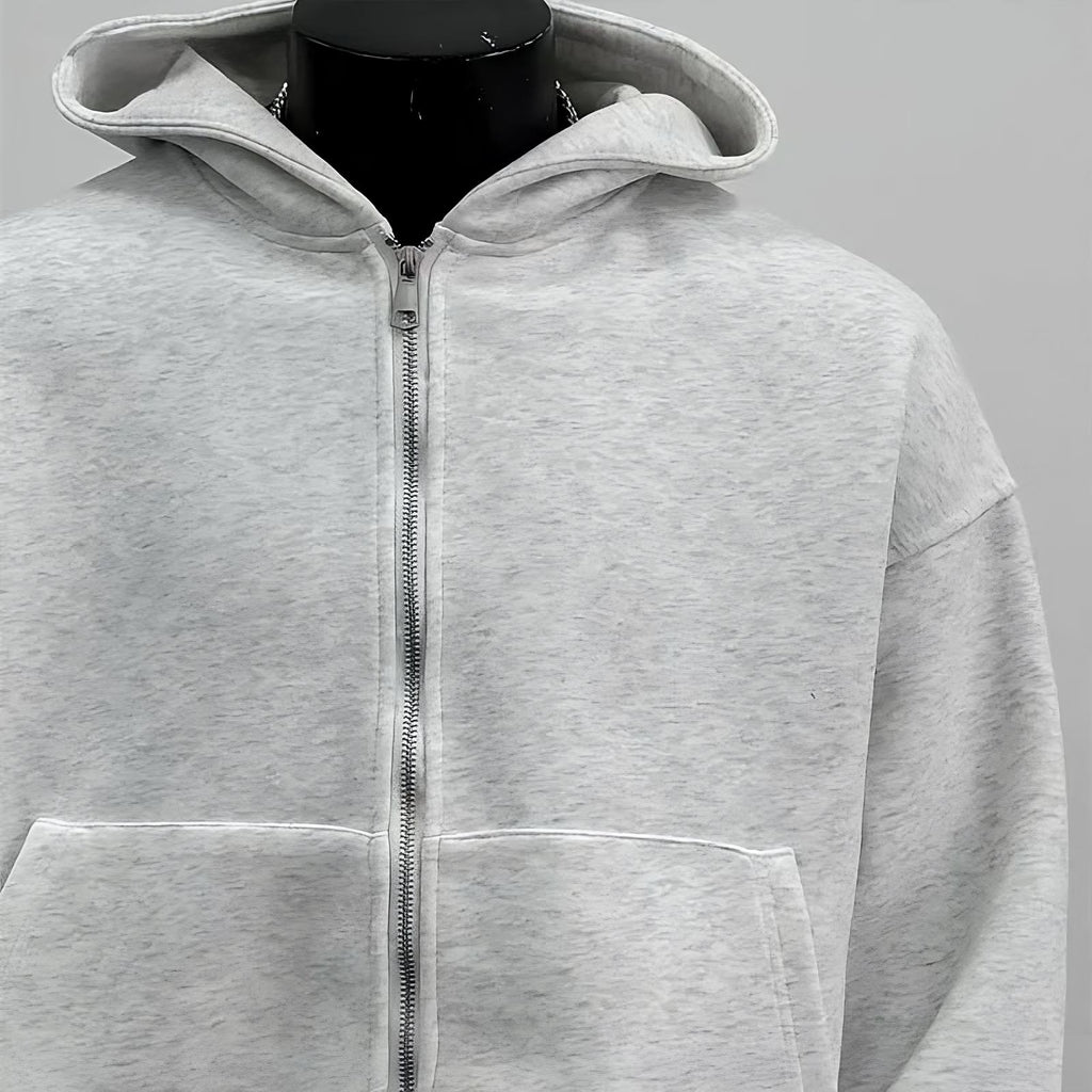 Sweat à capuche avec sac à dos intégré