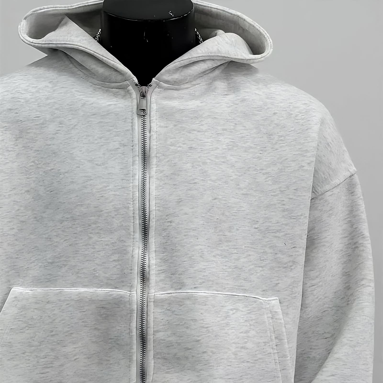 Sweat à capuche avec sac à dos intégré