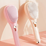 Brosse de massage télescopique autonettoyante