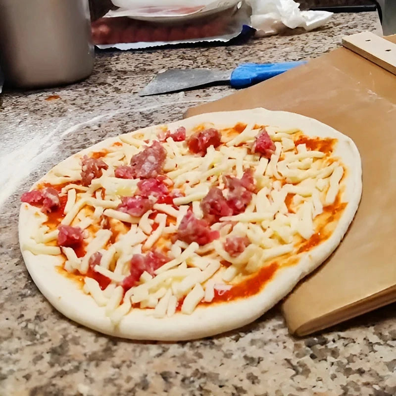 Pelle à pizza coulissante