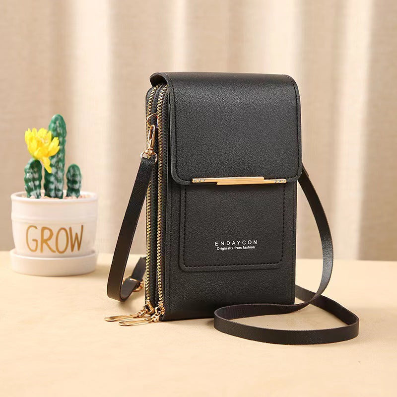 Petit sac pour femme avec zone tactile transparente.