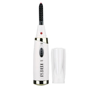 Recourbe-cils chauffant portable.