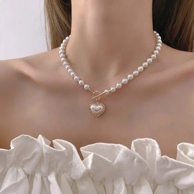 Collier pendentif en perles d'imitation.                          Imitation Pearls Pendant Necklace