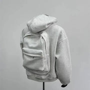 Sweat à capuche avec sac à dos intégré