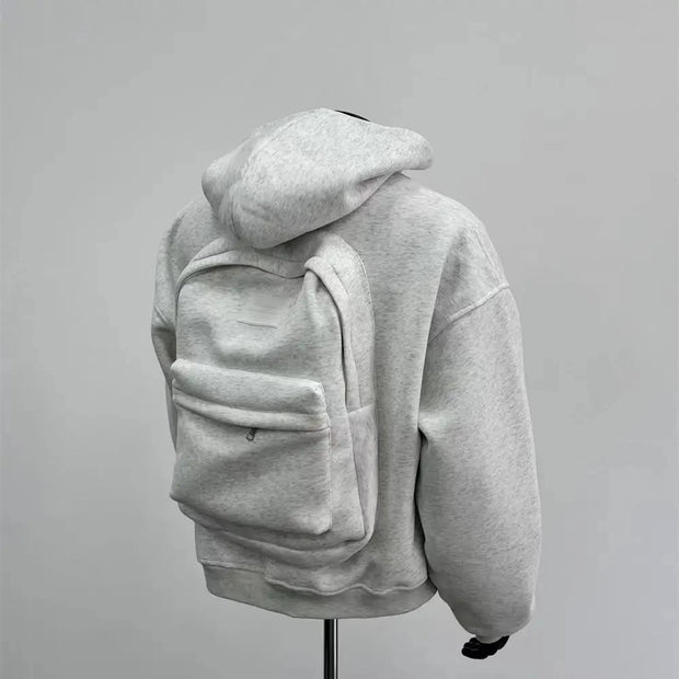 Sweat à capuche avec sac à dos intégré