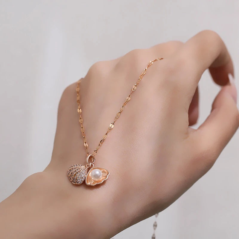 Collier de perles de coquillage ouvrable coréen.                  Korean Openable Shell Pearl Necklace