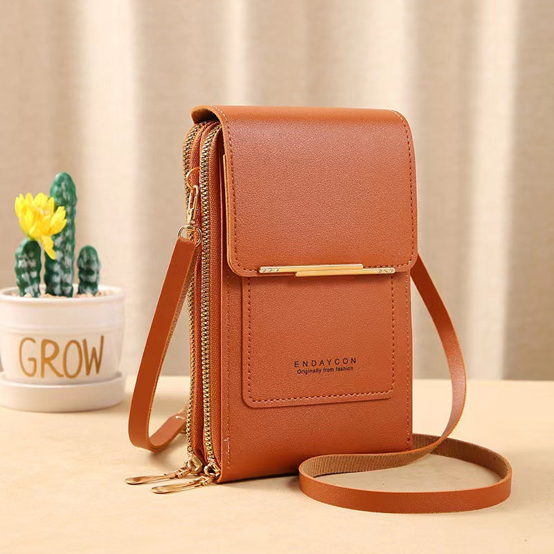 Petit sac pour femme avec zone tactile transparente.