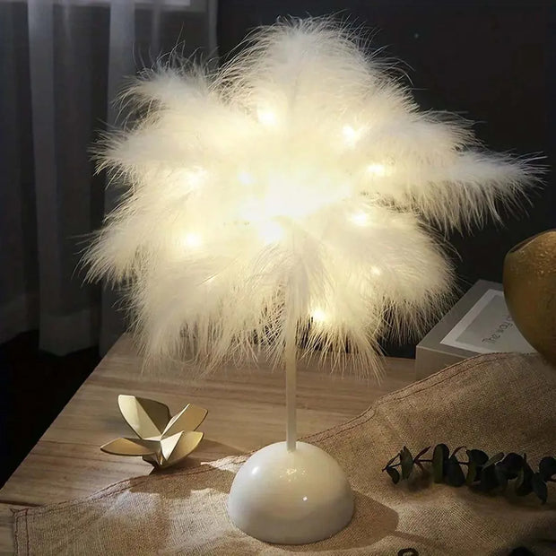 Lampe de table LED à motif de plumes.