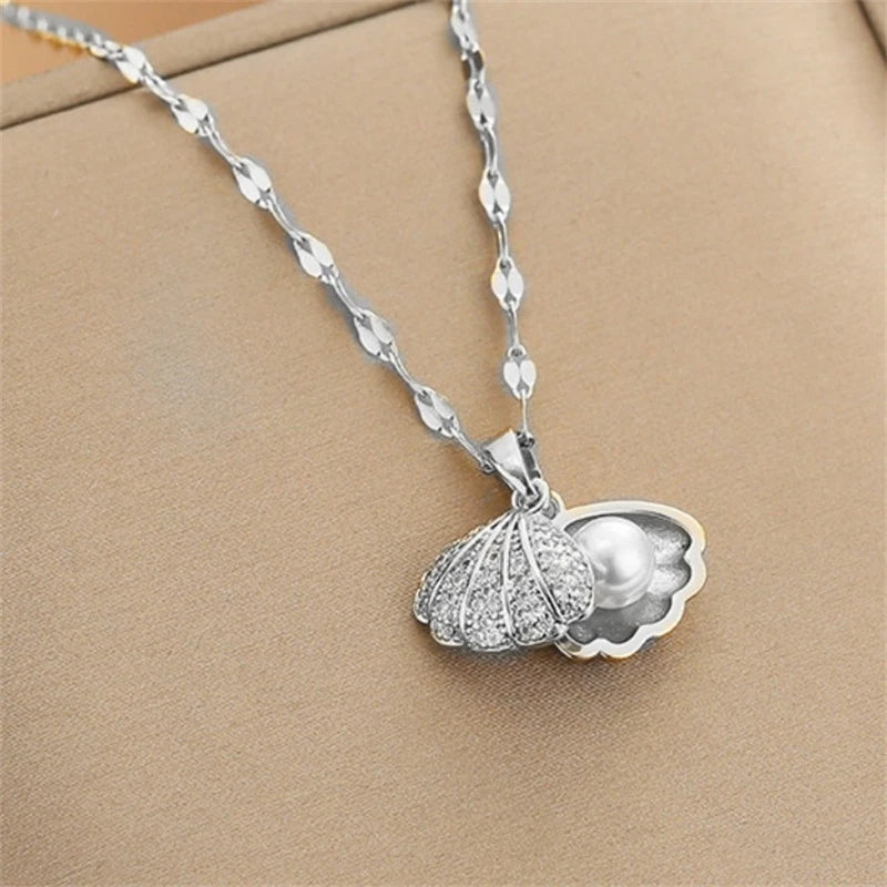 Collier de perles de coquillage ouvrable coréen.                  Korean Openable Shell Pearl Necklace