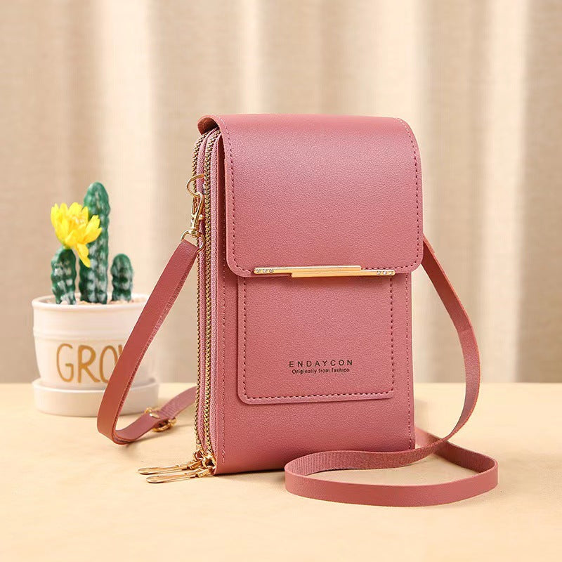 Petit sac pour femme avec zone tactile transparente.